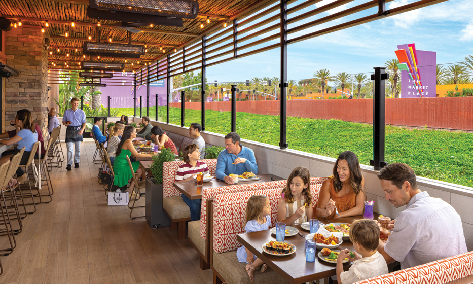 People dining on the patio at Pacific Catch at The Market Place in Tustin